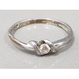 Ladies 9ct white gold diamond ring, comprising of a round brilliant cut diamond set in a rub over