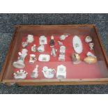 Vintage wooden display case with lift up lid, including contents, hornsea fauna, crested ware etc