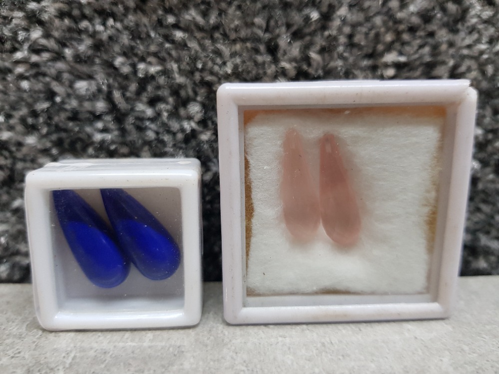 A pair of high polished lapis lazuli tear drop stones together with a pair of high polished rose