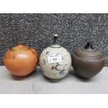 Three round studio pottery vase sculptures by Christine Gittins, Susanna Birley and Paul Muchin.