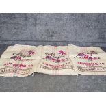 Three large Café Sofia hessian sacks.