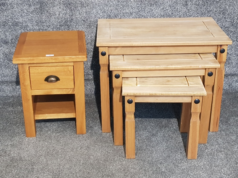 An oak bedside drawer and a nest of tables.