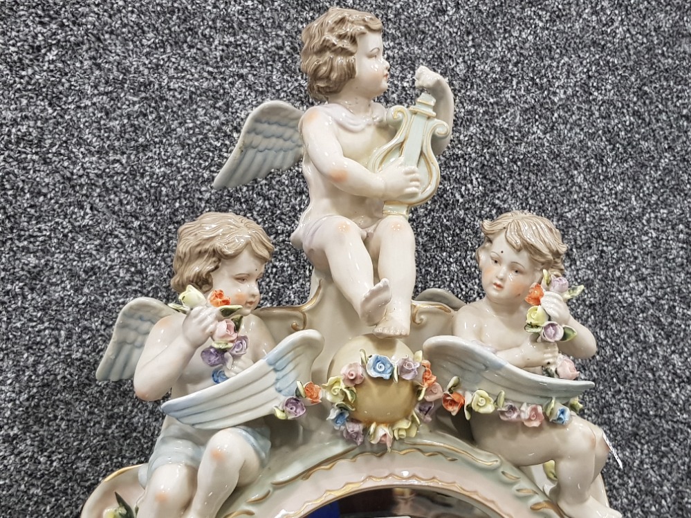 A late 19th century Sitzendorf porcelain toilet mirror decorated with cherubs and flowers 59 x - Image 2 of 6