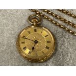 Gold open faced pocket watch with champagne dial and black Roman numerals. Accompanied with 15ct