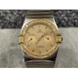 Omega gents Bi-metal Constellation watch. Gold with champagne diamond dot dial, diamond bezel and