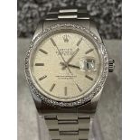 Rolex Datejust 36mm s/steel with Silver/Rhodium dial, gold batons and Diamond bezel. In original box