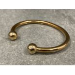 Heavy 9ct gold solid torque bangle (29.1g)