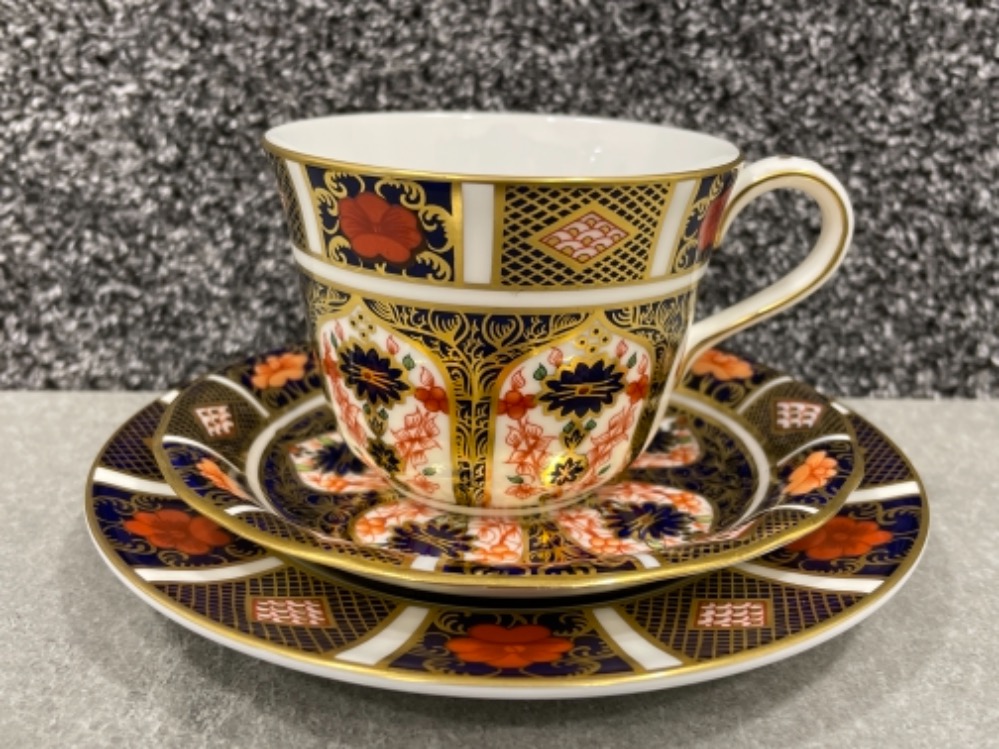 Royal Crown Derby old Imari patterned trio. In good condition.