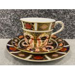 Royal Crown Derby old Imari patterned trio. In good condition.