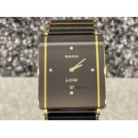 Rado gents watch with jubile design. Date display and Quartz movement with original box