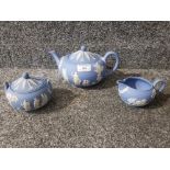 A wedgwood blue jasperware three piece tea set.