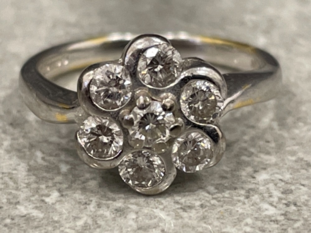 18ct white gold Diamond cluster ring. Comprising of 7 round brilliant cut diamonds, all set with rub - Image 2 of 3