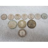 2 x silver half crowns dated 1920,1928 & 1 other dated 1955, also includes 7 one shilling coins