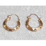 A pair of 9ct yellow gold creole hoop earrings 1.08g.