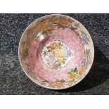 A Maling Rosine pattern pink lustre bowl 21cm diameter.