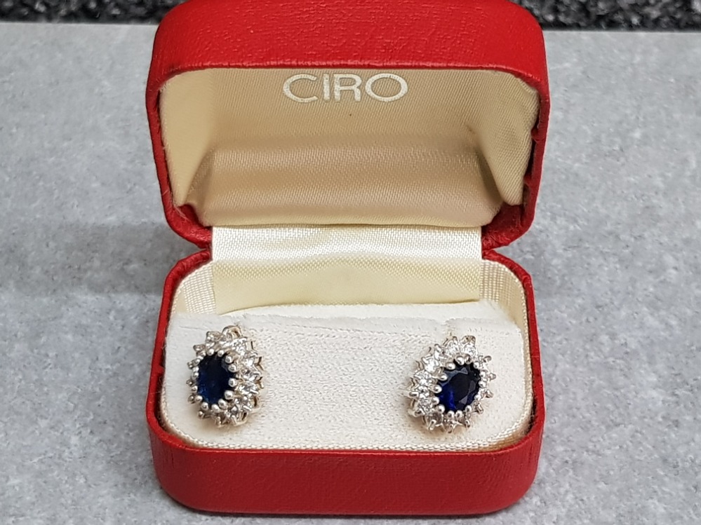 A pair of blue and white paste stud earrings in Ciro box