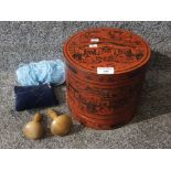 A Japanese papier mache cylindrical sewing box with contents 22cm high.