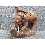 Oriental style wooden hand carved elephant rider, height 22cm