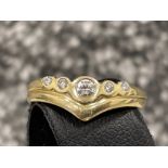 Ladies 9ct gold diamond wishbone ring. Set with 5 round brilliant cut diamonds. 1.5G size L