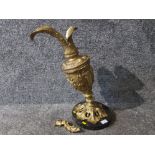 A metal lamp in the form of a ewer on circular marble base, made in Spain (SAS).