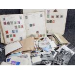 Box containing a large Quantity of stamps from atound the world also includes 1950s postcards