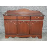 Mahogany Rossmore sideboard three drawers above the cupboard doors 119 x 88 x 48.5cm.