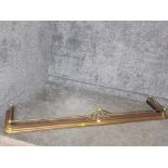 A Victorian brass extendable fire curb 192cm wide.