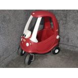 A Little Tikes push along car.