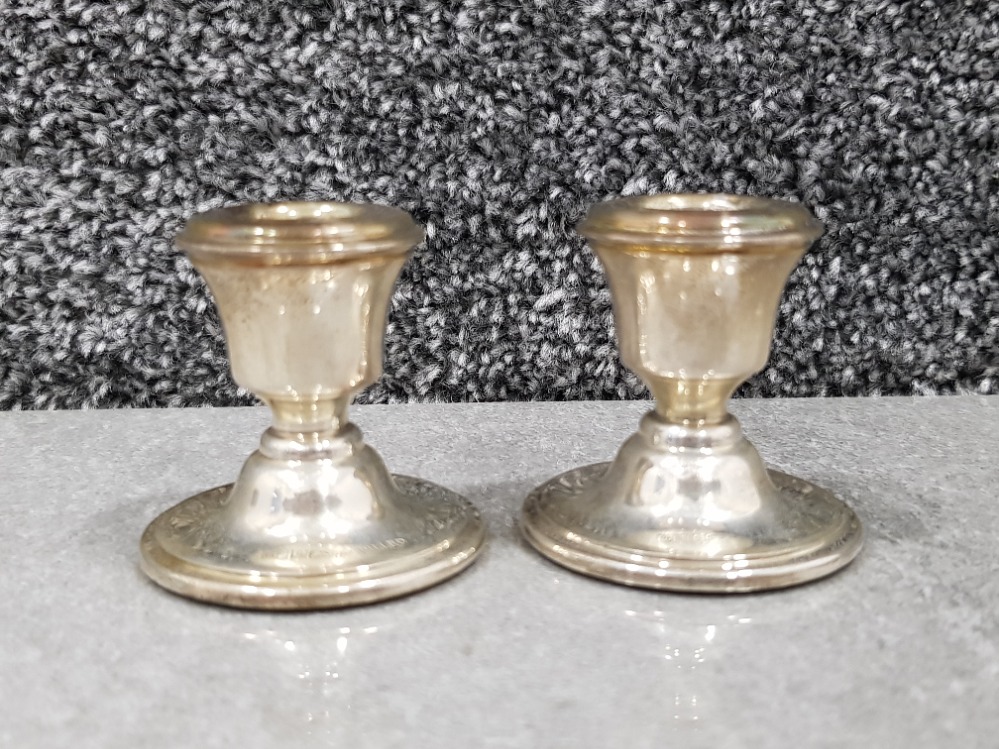 2 small silver candle holders in original box 55.1g gross