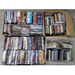 4 boxes containing mixed genre DVDs & CDs