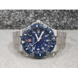 Gents stainless steel victorinox swiss army watch with blue dial and bezel date display at 3