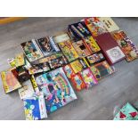 Box containing 24 miscellaneous vintage boardgames including Traffic Jam, blow football and