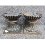Pair of heavy cast iron urns, height 18.5cm