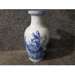 A Chinese blue and white vase with bird decoration, mark to base 47cm high.