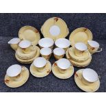 A CWS Windsor China Art Deco tea service comprising sandwich plate, teacups, saucer, tea plates,