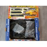 Box of various train tracks including Hornby