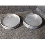 Eleven heavy duty aluminium pizza trays.