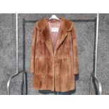 A ladies pale brown mink fur 3/4 length jacket by Fenwick French Salon size 12 approx.