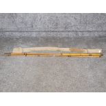 A Thompson 15ft bamboo salmon rod in canvas bag.