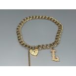 9ct gold bracelet, comprising of double links and heart padlock clasp. 8.6g