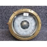 A Sestrel brass ship's compass no 6464/TMO 25cm diameter.