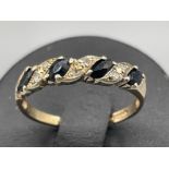 9ct gold diamond and sapphire ring. Size M 1.65g