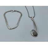 Silver pendant and necklace along with silver bracelet