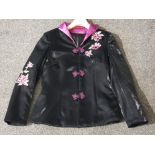 A ladies Chinese embroidered jacket.