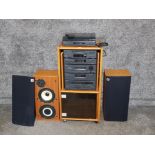A Sony hifi system in teak cabinet and a pair of Celestion UL8 speakers.