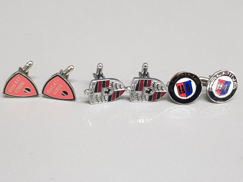 Three pairs of cufflinks in the style of Ducatti Corse, Porsche and Alpina.