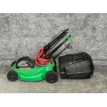 Green line lawnmower with basket