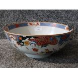 A 19th century Chinese bowl with enamel decoration 26cm diameter.