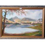 An oil painting by C Whitehead 'view of the Lake District' signed and dated 1982 50 x 75cm.