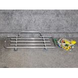 Sports car boot rack with fittings straps and bungee cords.